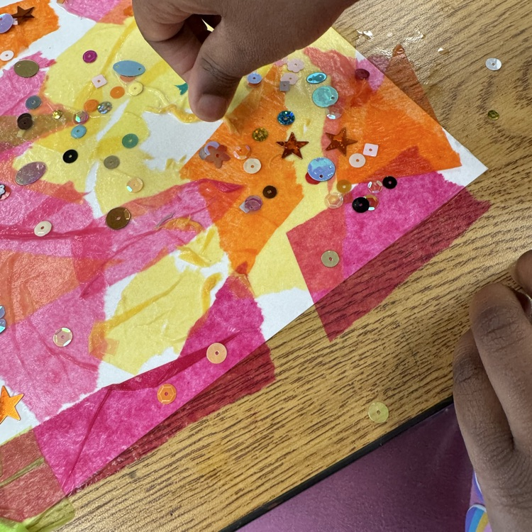 tissue paper, gems, and water 