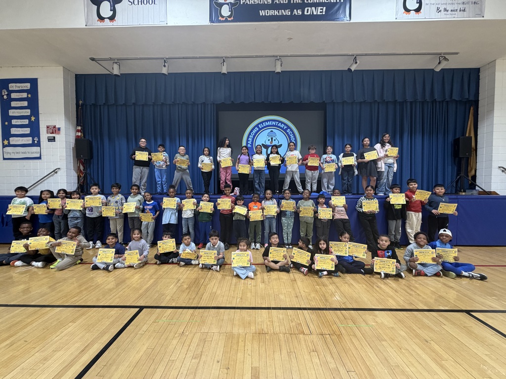 Large group of students holding certificates 