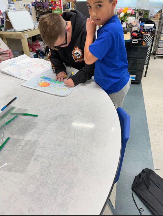 Kids working on posters called positive pillowcase