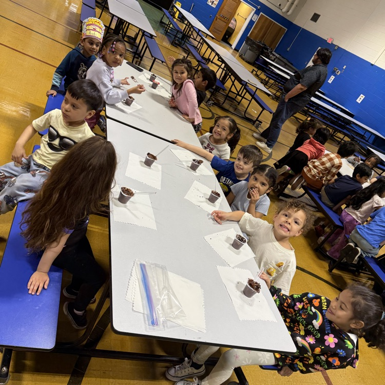 Kids sitting at a cafeteria table