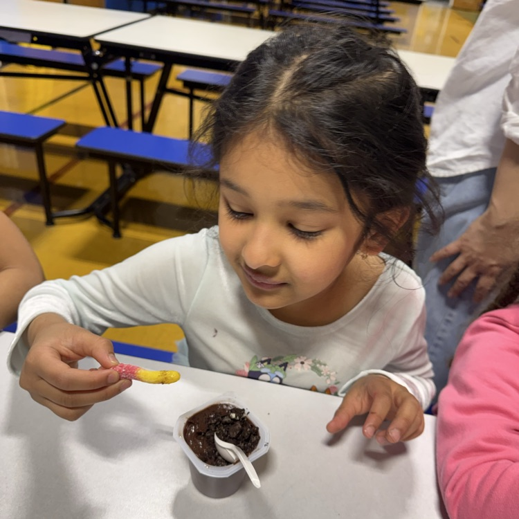Kids sitting at a cafeteria table