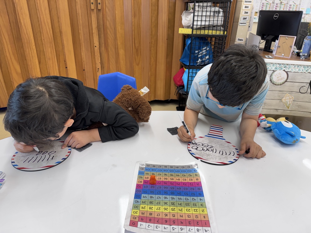 Rather than writing the covered number, students drew tens and ones to represent the number.