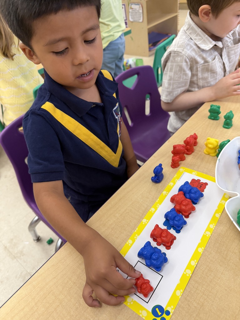Students work together to create patterns. 
