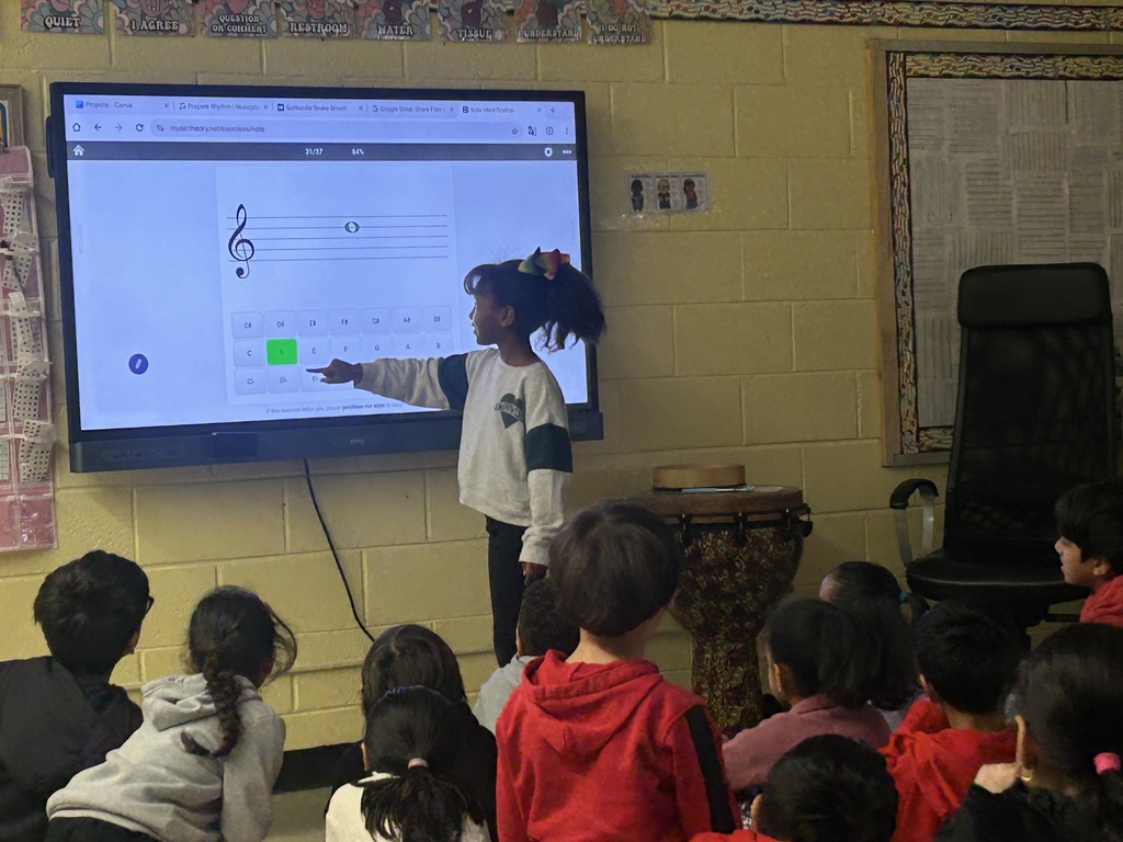 3rd grade student identifies notes on the treble clef staff using "musictheory.net"
