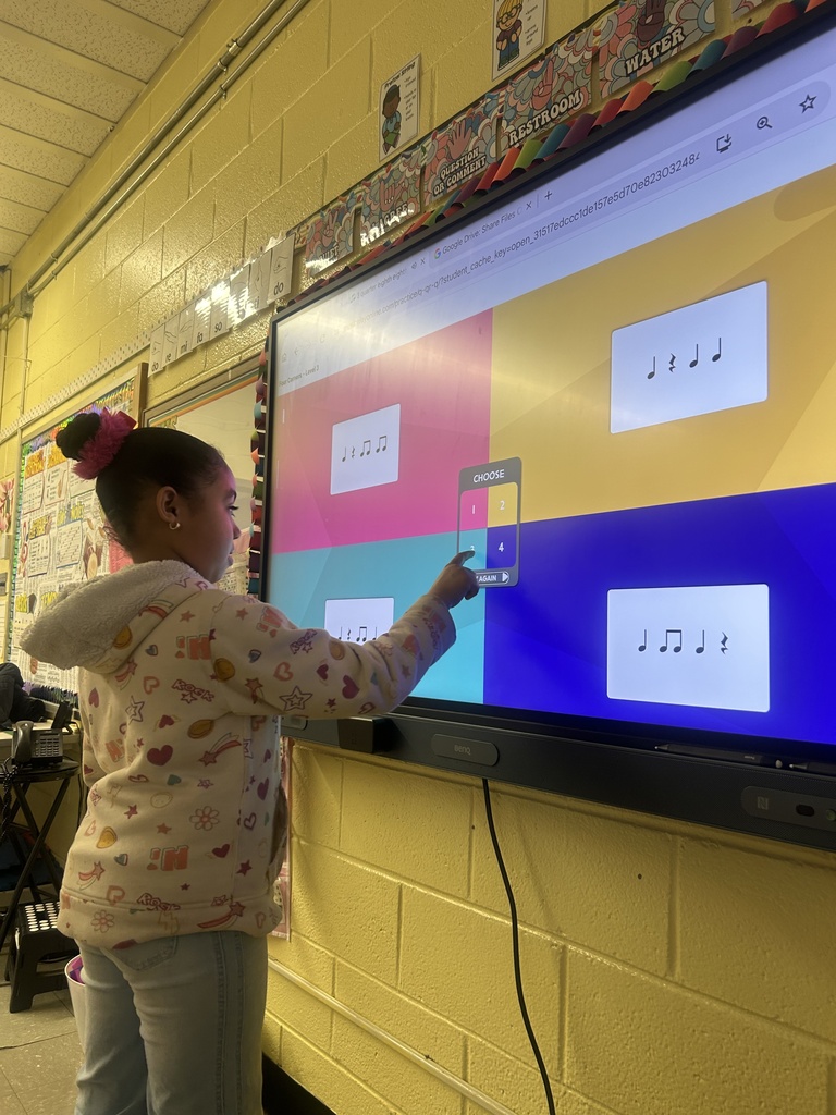 2nd grade student identifies rhythms by sound using "Music Play Online"
