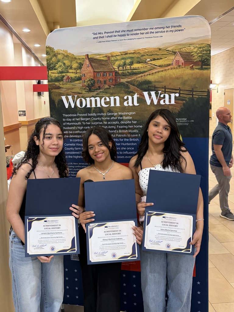 Loraini, Olanyi, and Keiry with their "History Happened Here" contest certificates.
