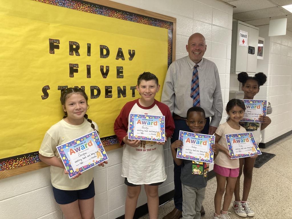 Friday Five 5/29/26 - Group of students with certificates with the principal