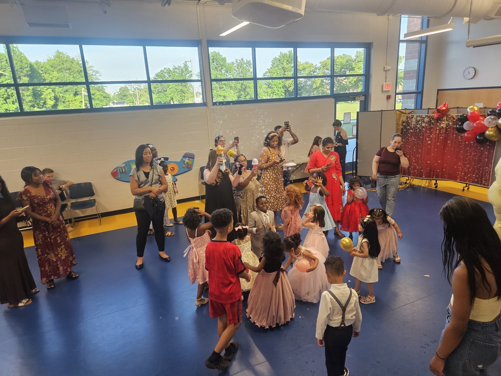 Students dancing on gym floor