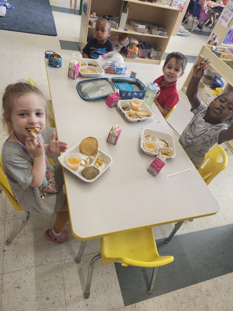 Students eating lunch at a table