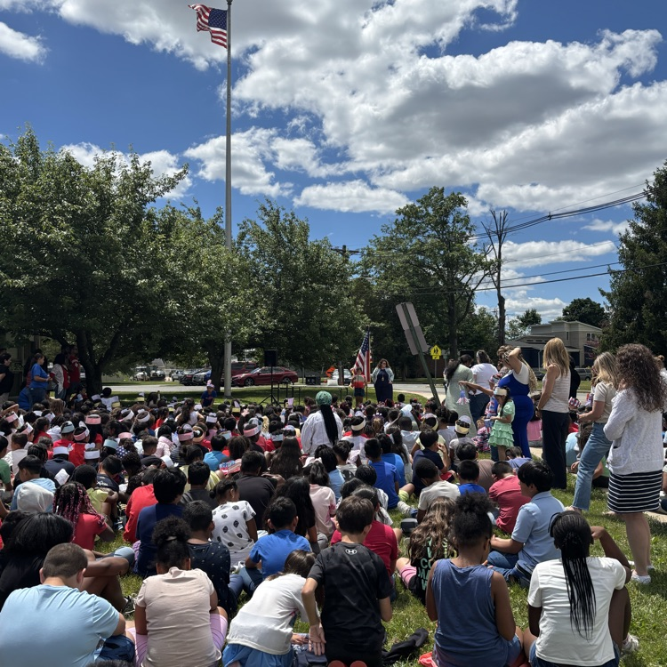 students at a flag day assembly