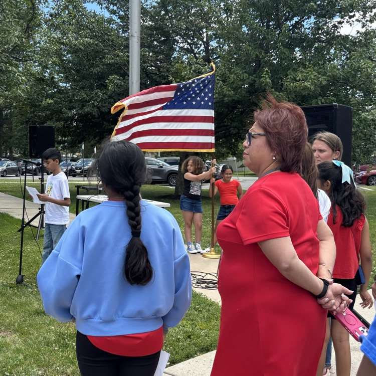 students at a flag day assembly