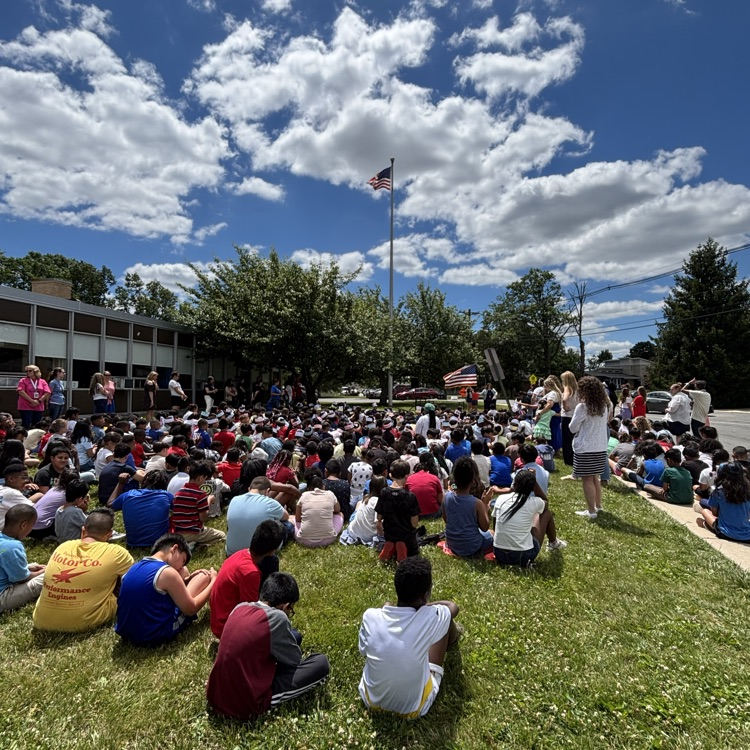 students at a flag day assembly