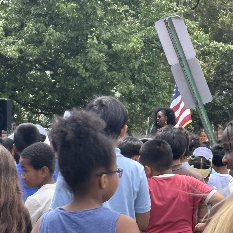 students at a flag day assembly
