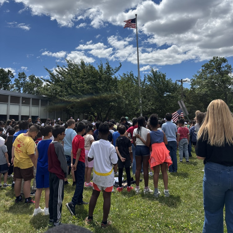 students at a flag day assembly