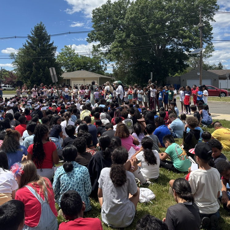 students at a flag day assembly