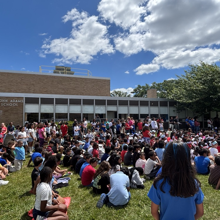 students at a flag day assembly