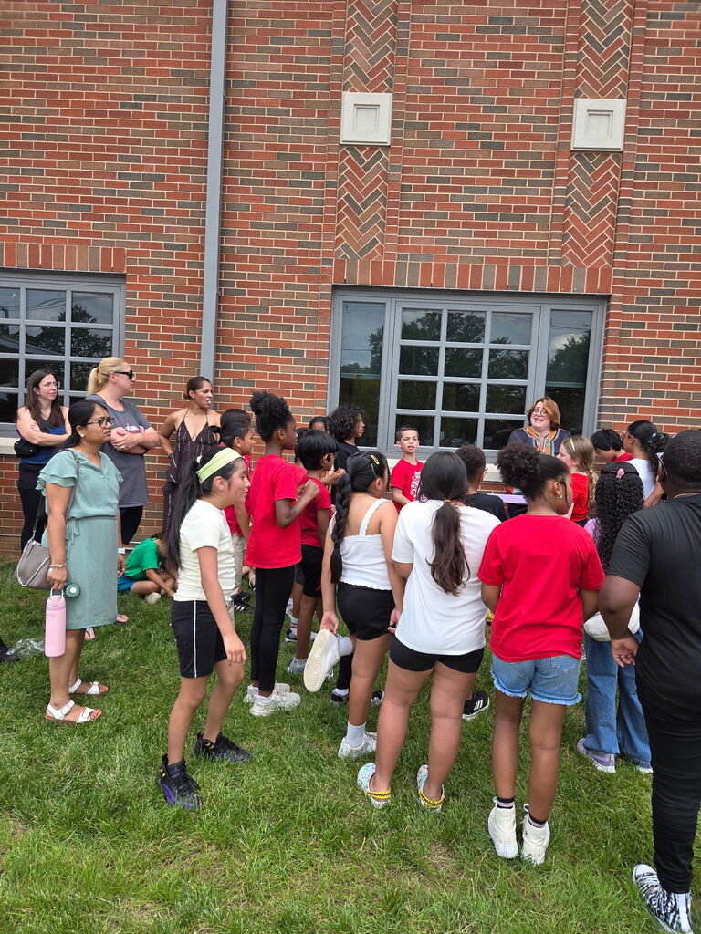 Students singing in a group