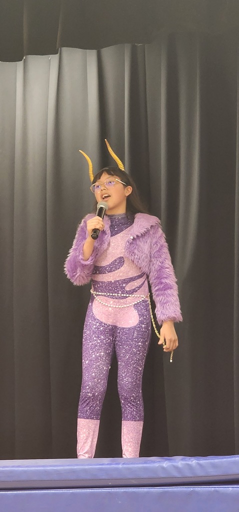 Student performing on stage