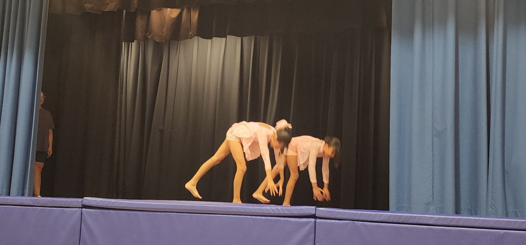 Students performing on stage