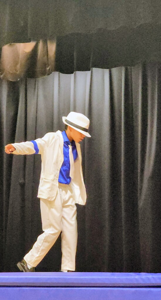 Student performing on stage