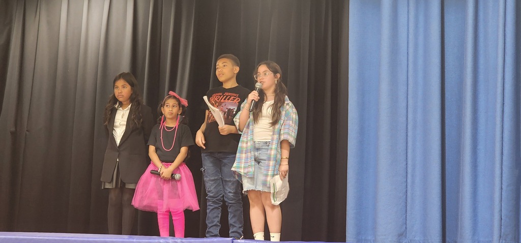 Students performing on stage