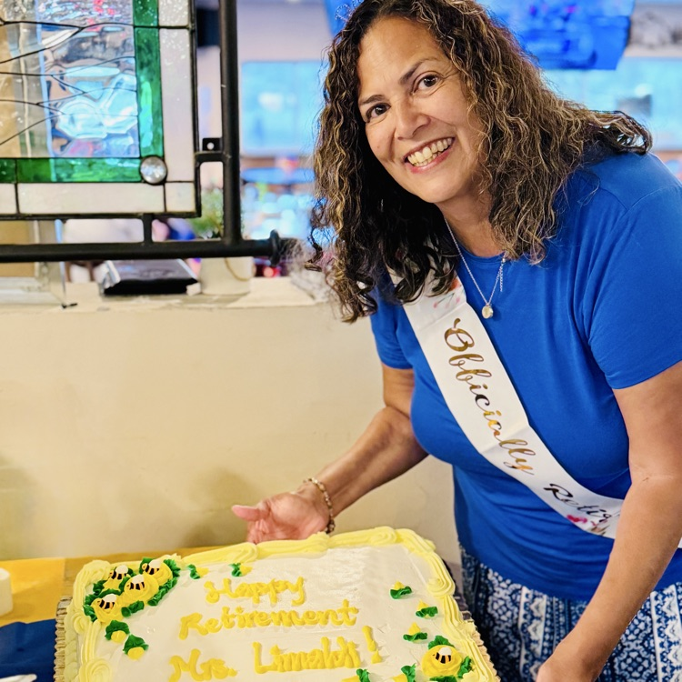 Staff with retirement cake