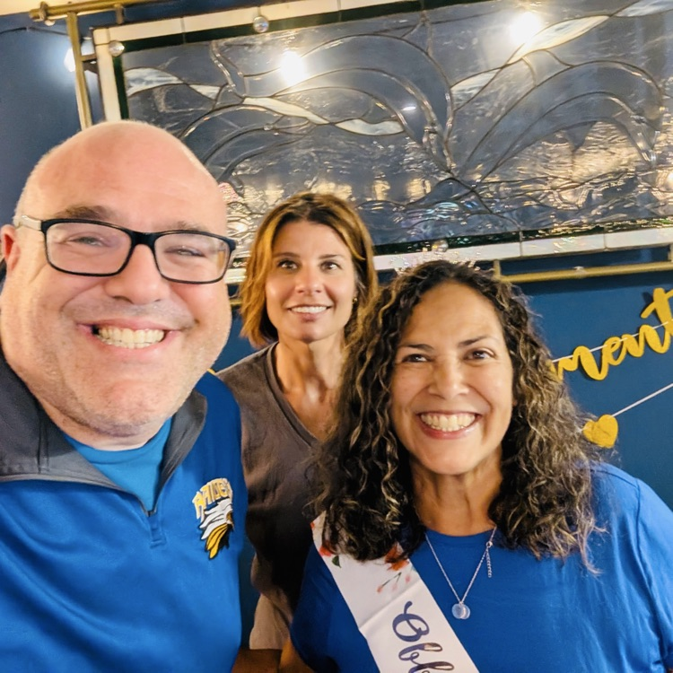 Selfie of three staff members