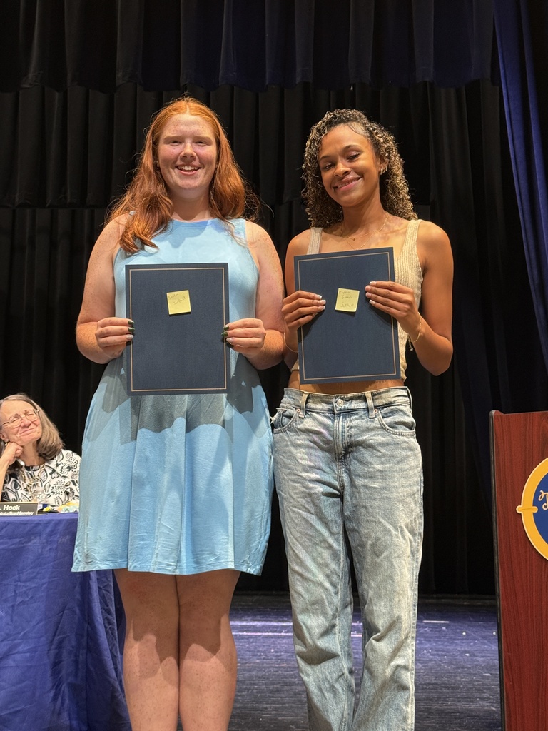 Students receiving award recognitions from BOE