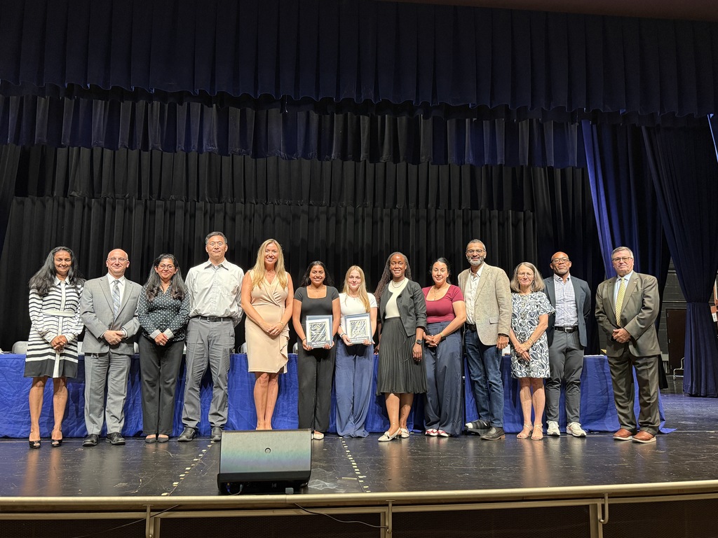 Students receiving award recognitions from BOE