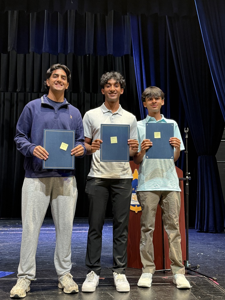 Students receiving award recognitions from BOE