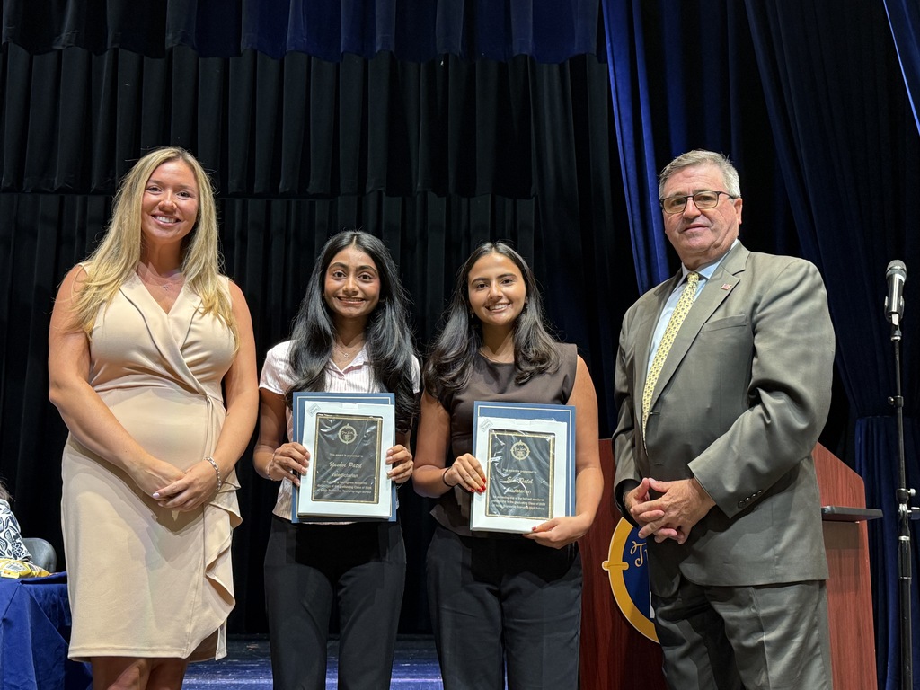 Students receiving award recognitions from BOE