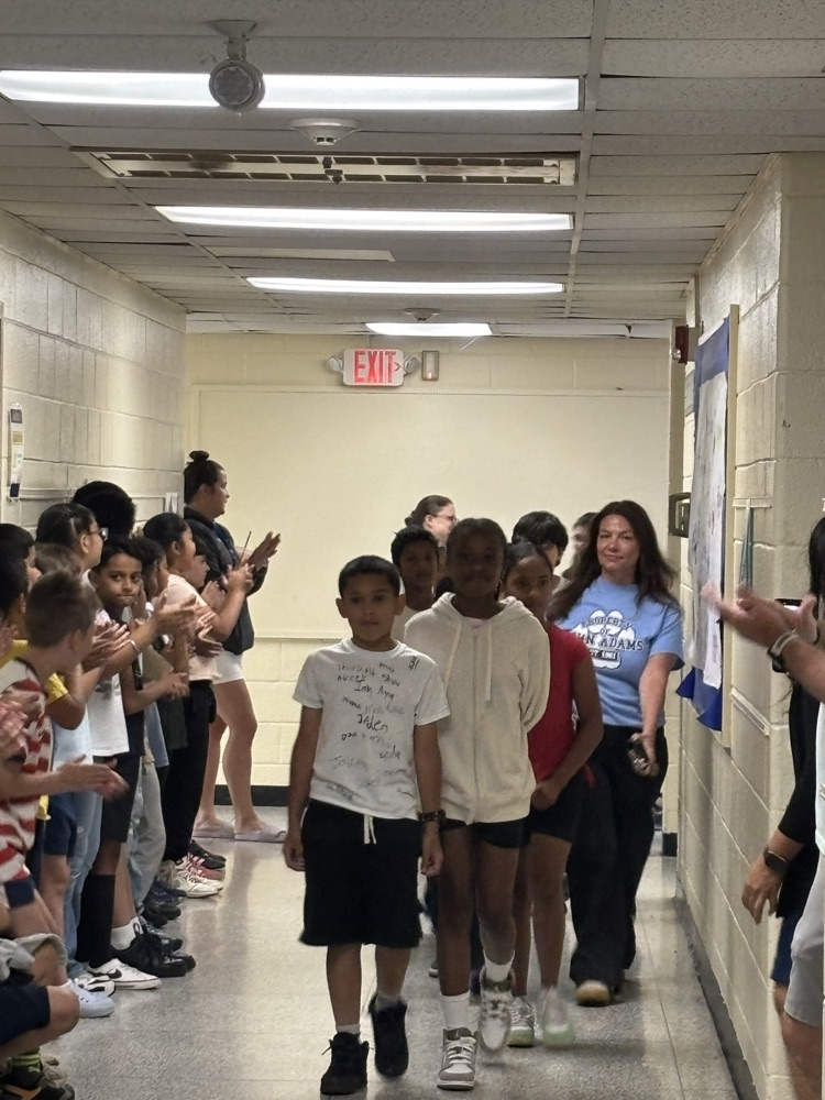 Students being clapped on 