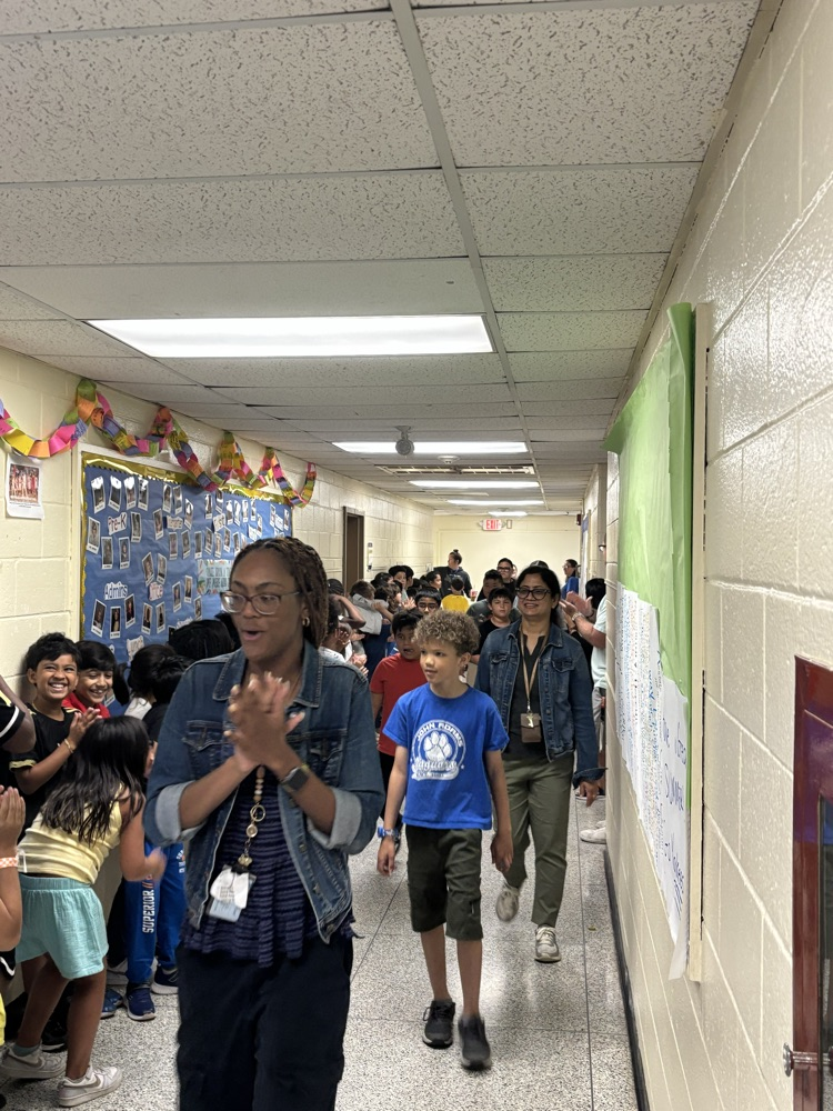 Students being clapped on 