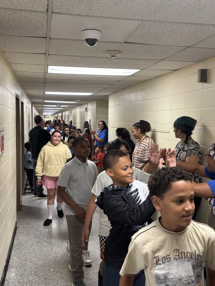 Students being clapped on 
