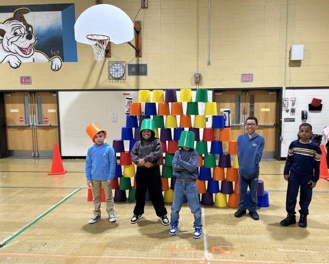 Students playing games in a gymnasium