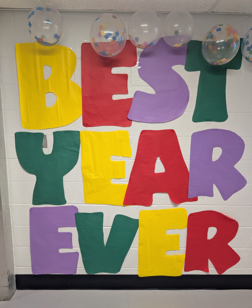 BUlletin board reading "Best Year Ever"