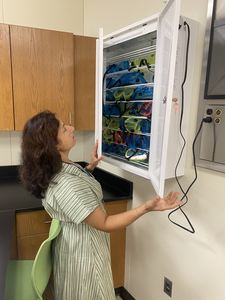 NBTHS Science Teacher Checking Goggles
