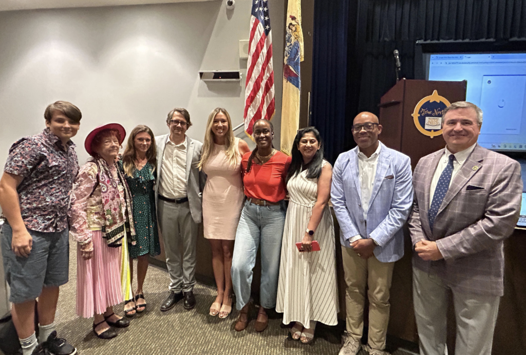 Group of adults standing together at a school convocation