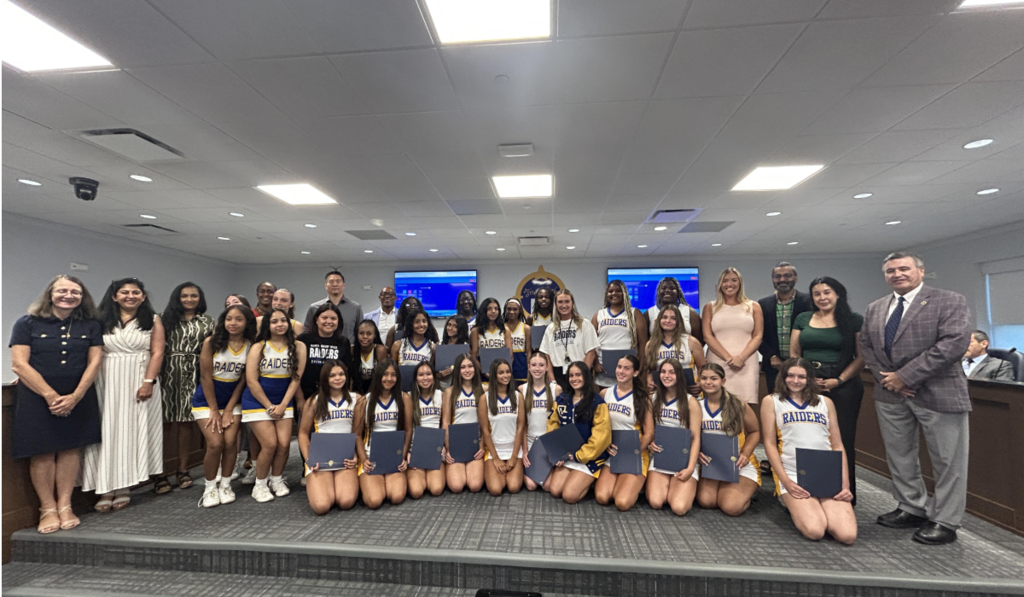 Cheerleaders being honored at BOE meeting