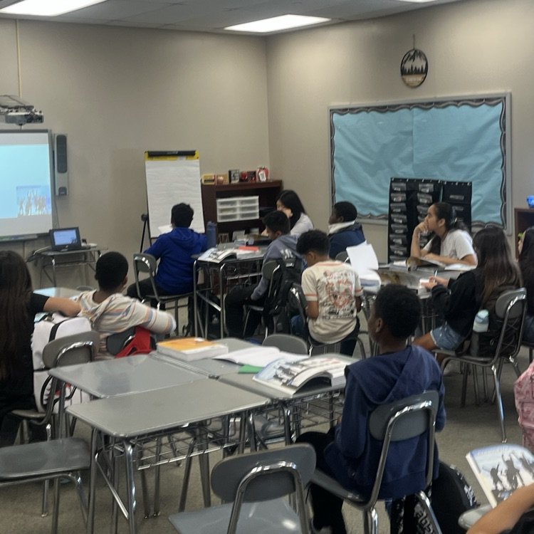6th graders engaging in thoughtful discussions about ELA topics in Mr. Kramer’s class! 📚