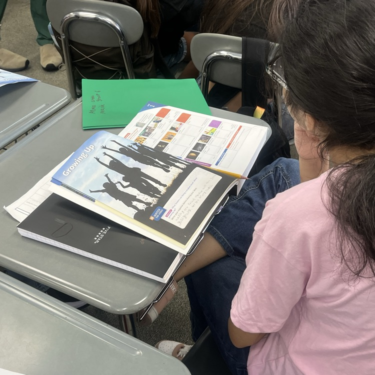 6th graders engaging in thoughtful discussions about ELA topics in Mr. Kramer’s class! 📚