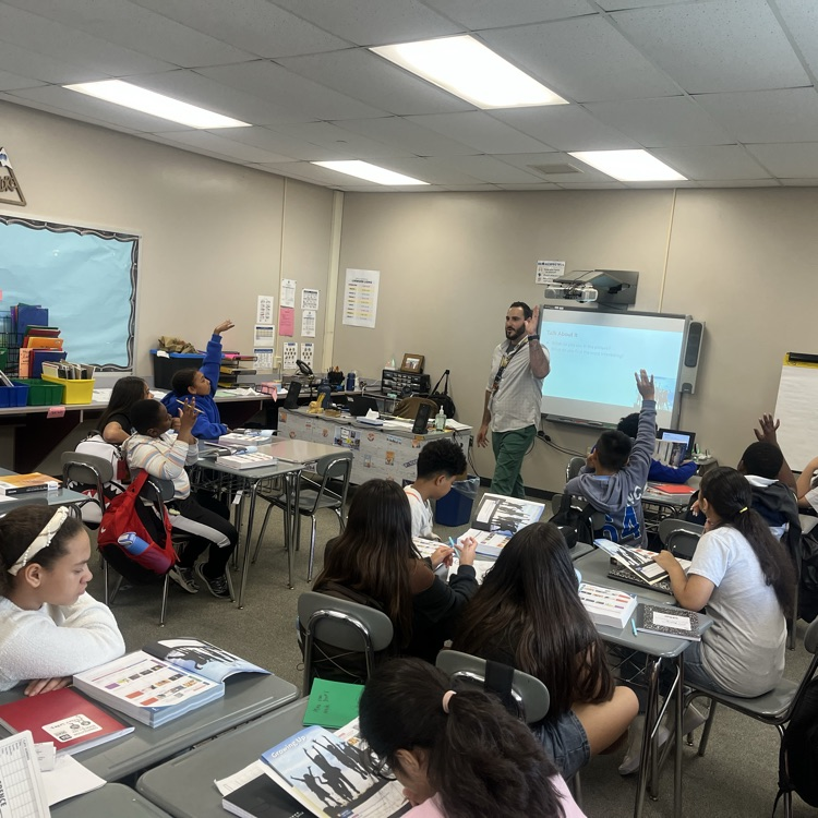 6th graders engaging in thoughtful discussions about ELA topics in Mr. Kramer’s class! 📚