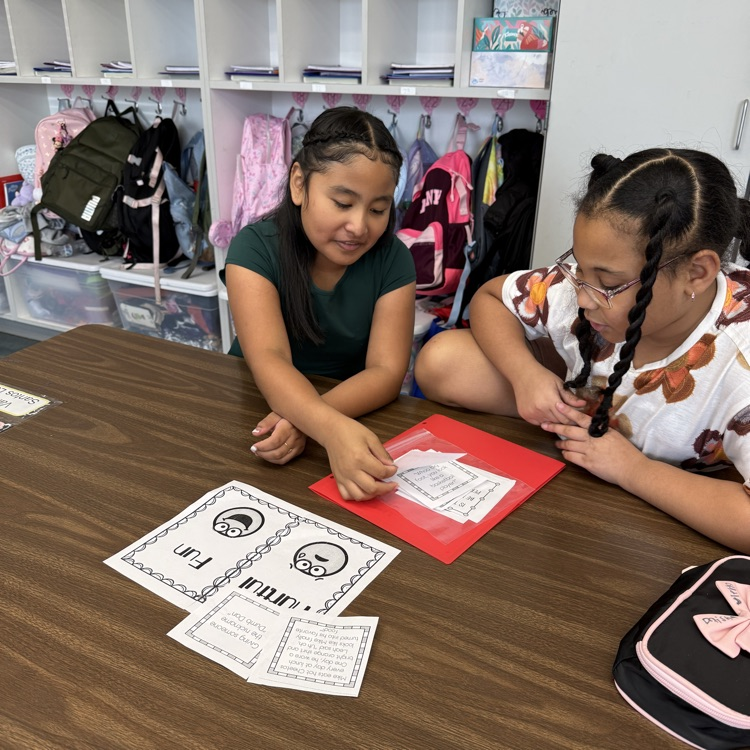 Students working togeter at  table
