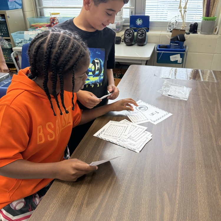 Students working togeter at  table
