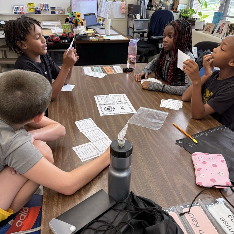 Students working togeter at  table