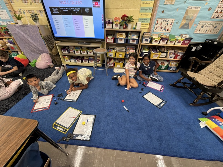 students in Mrs. Del Borrello’s class are working in stations and establishing math routines