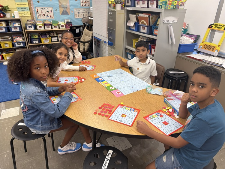 students in Mrs. Del Borrello’s class are working in stations and establishing math routines