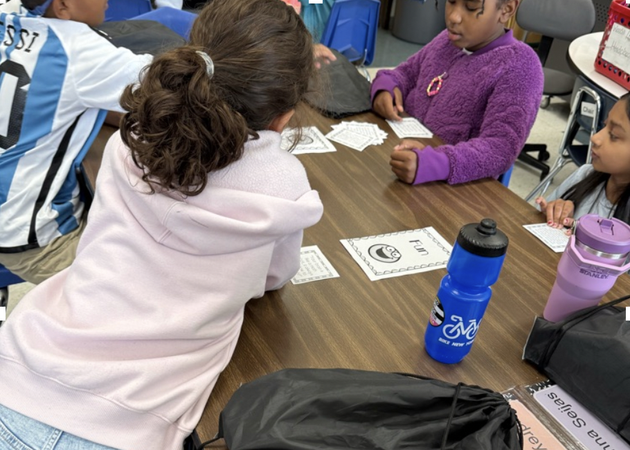 Students working togeter at  table