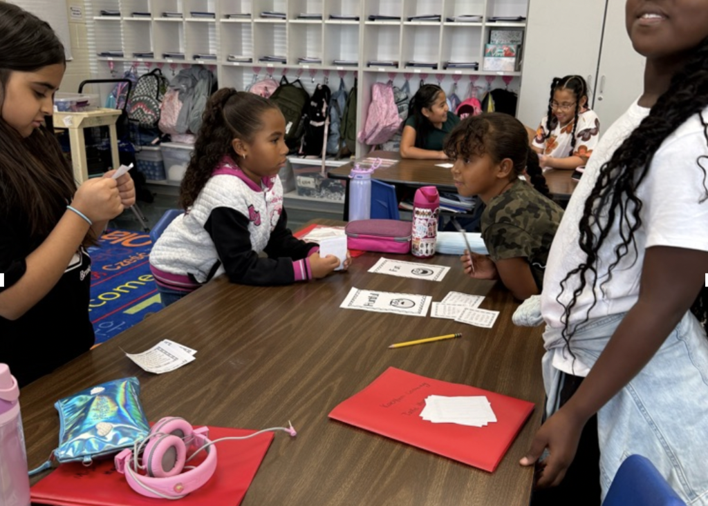 Students working togeter at  table