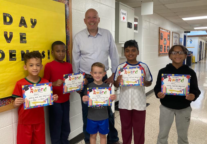 Friday Five 9/18/26 group of students with principal